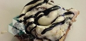 Кофейня со службой доставки Cinnabon в ТЦ Оранжевый