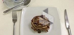 Кофейня со службой доставки Cinnabon в ТЦ Оранжевый